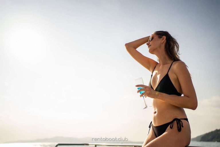 caucasian-woman-in-bikini-drink-champagne-while-ha-Vi-Charter-Mallorca-book-today caucasian-woman-in-bikini-drink-champagne-while-ha-Vi-Charter-Mallorca-book-today