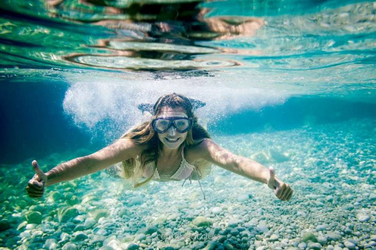 snorkeling-in-the-tropical-sea-woman-shows-thumb-Vi-Charter-Mallorca-book-today snorkeling-in-the-tropical-sea-woman-shows-thumb-Vi-Charter-Mallorca-book-today