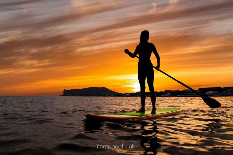 stand-up-paddle-boarding-on-a-quiet-sea-with-warm-Vi-Charter-Mallorca-book-today stand-up-paddle-boarding-on-a-quiet-sea-with-warm-Vi-Charter-Mallorca-book-today